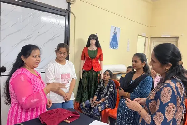 Students doing aari embroidery at Anjan Institute of Fashion Design