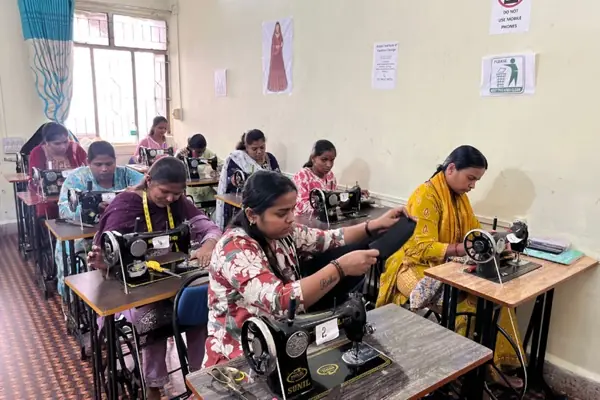 Students learning pattern making at Anjan fashion design institute